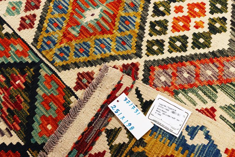 A Kilim carpet, c. 251 x 198 cm.