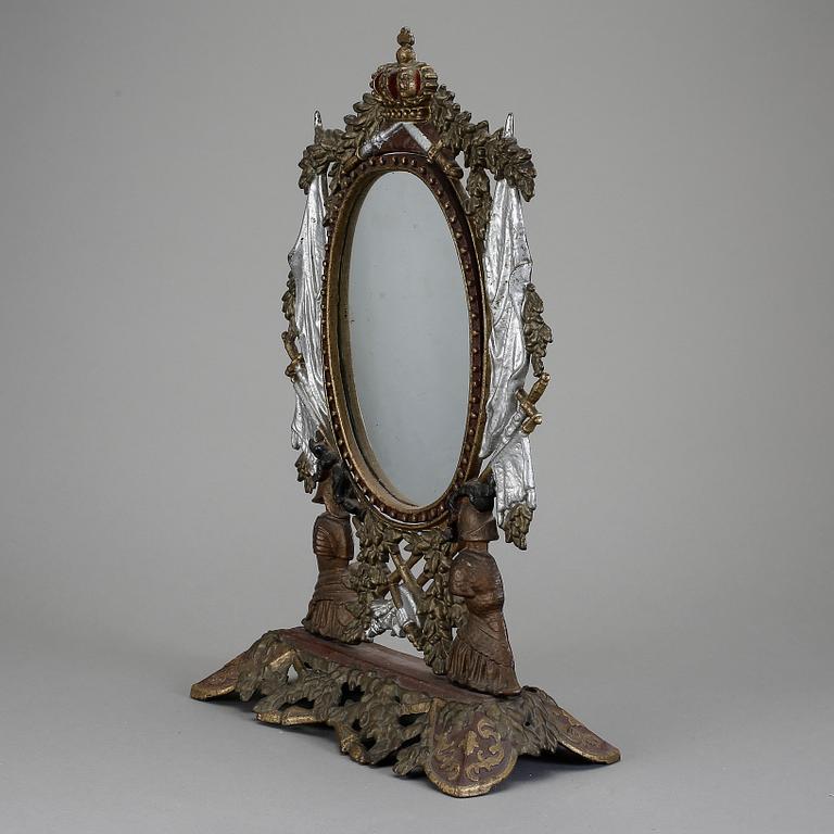 BORDSSPEGEL, gjutjärn, sannolikt Huseby bruk. 1800-talets slut.