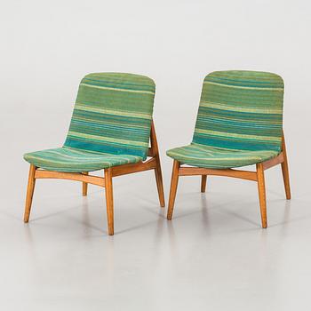 A pair of 1960's easy chairs.