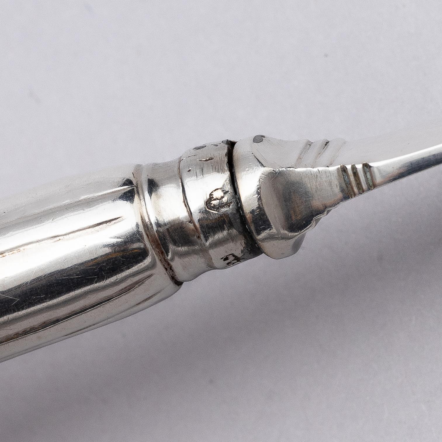 A Swedish set of 19 piece silver table-cutlery, marks of  Isak Trybom, Stockholm 1779-1780.