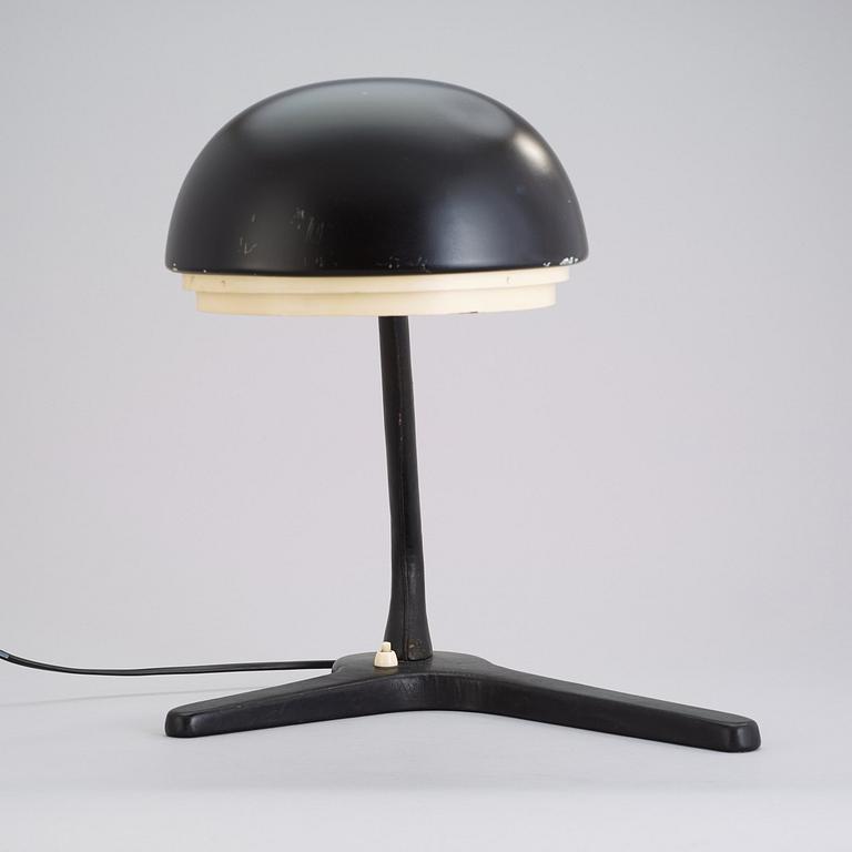 An Alvar Aalto table lamp, manufactured by Valaistustyö, Finland 1950's, model A 704.