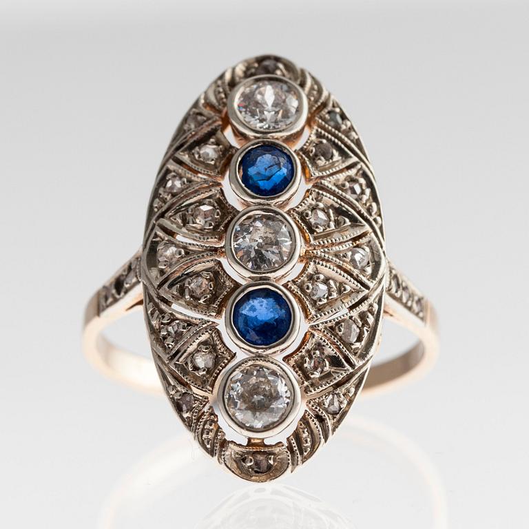 A RING, 14K gold, old- and rose cut diamonds c. 0,75 ct, sapphires. Size 17,5. Weight 5 g.