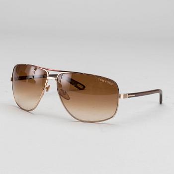 Two pair of Tom Ford Sunglasses.