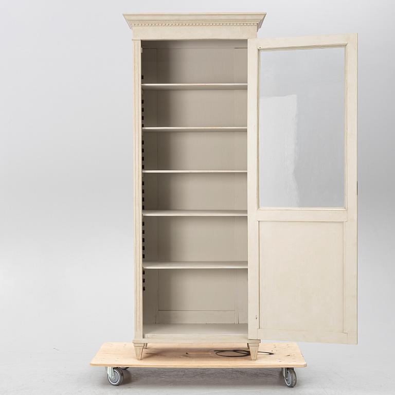 Display cabinet, early 20th century.