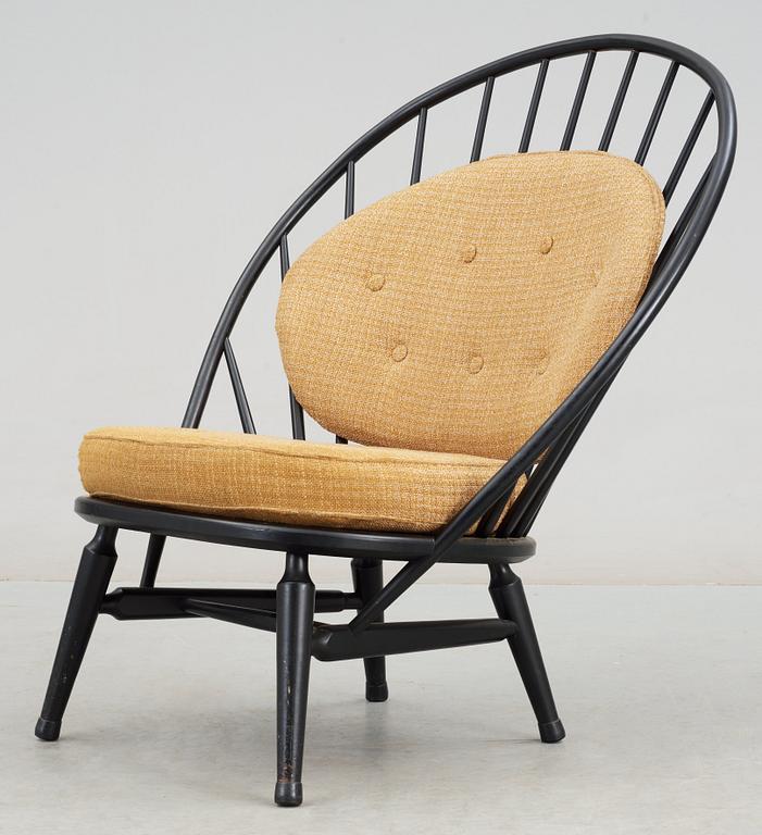 A Sven Engström & Gunnar Myrstrand black lacquered easy chair, 'Bågen', Nässjö Stolfabrik, Sweden 1950's.