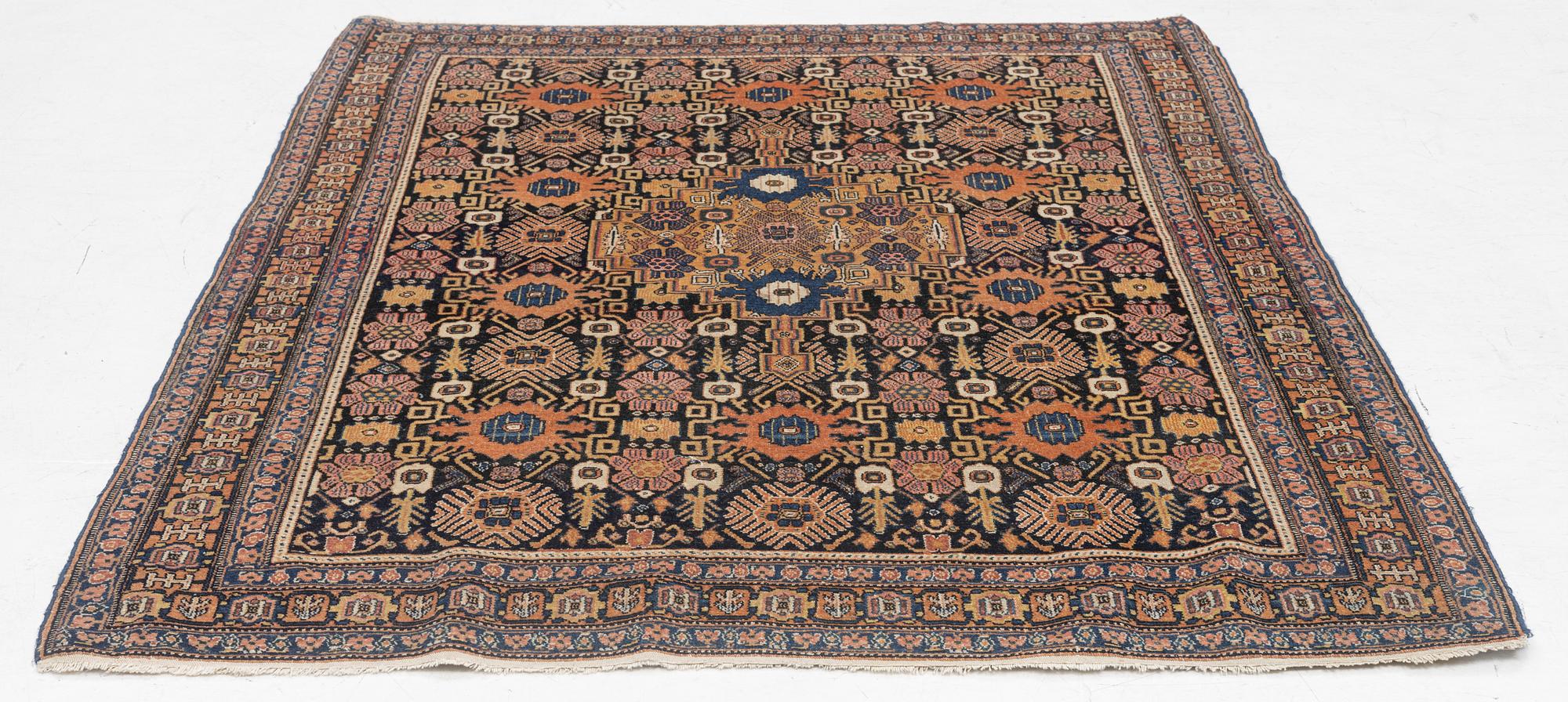 A Senneh carpet, c. 187 x 140 cm.