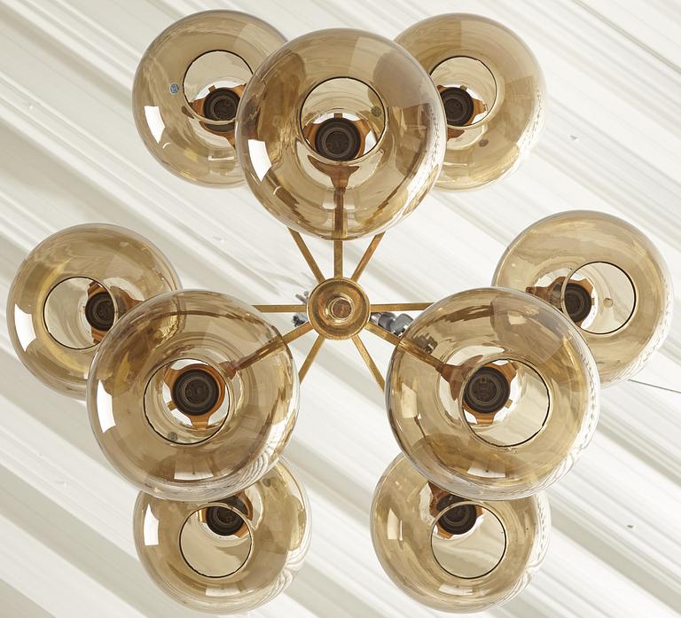 HANS-AGNE JAKOBSSON, a brass and glass nine-light ceiling light from Markaryd, second half of the 20th century.