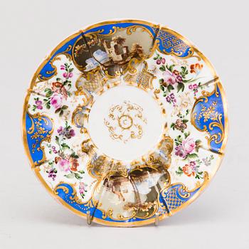 A Popov porcelain cup with saucer, Russia mid-19th Century.