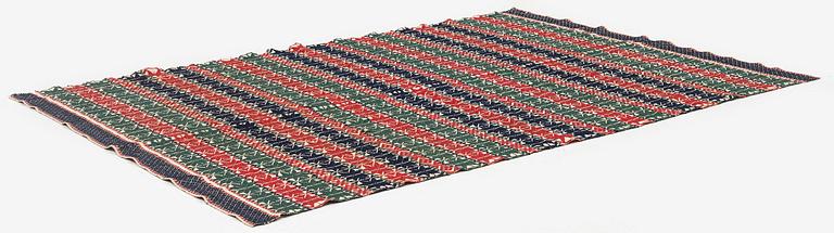 A bed cover in weft-patterned tabby type, c. 180 x 126, Scania, Sweden, first half of the 19th century.