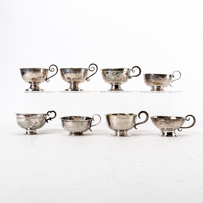 A Swedish 19th century set of eight silver cups, weight 168 grams.