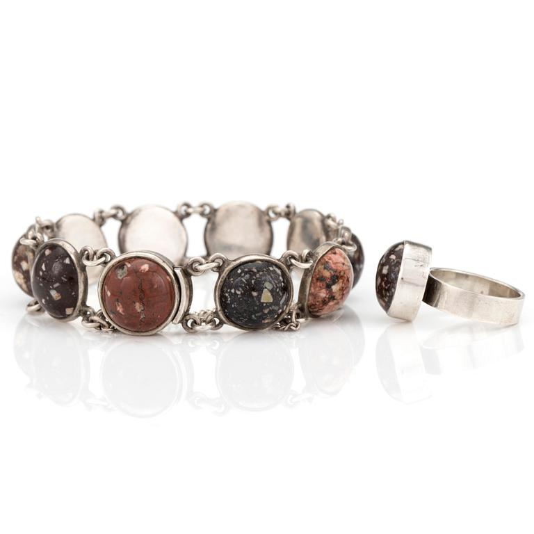 A silver bracelet and ring set with round, cabochon-cut porphyry.