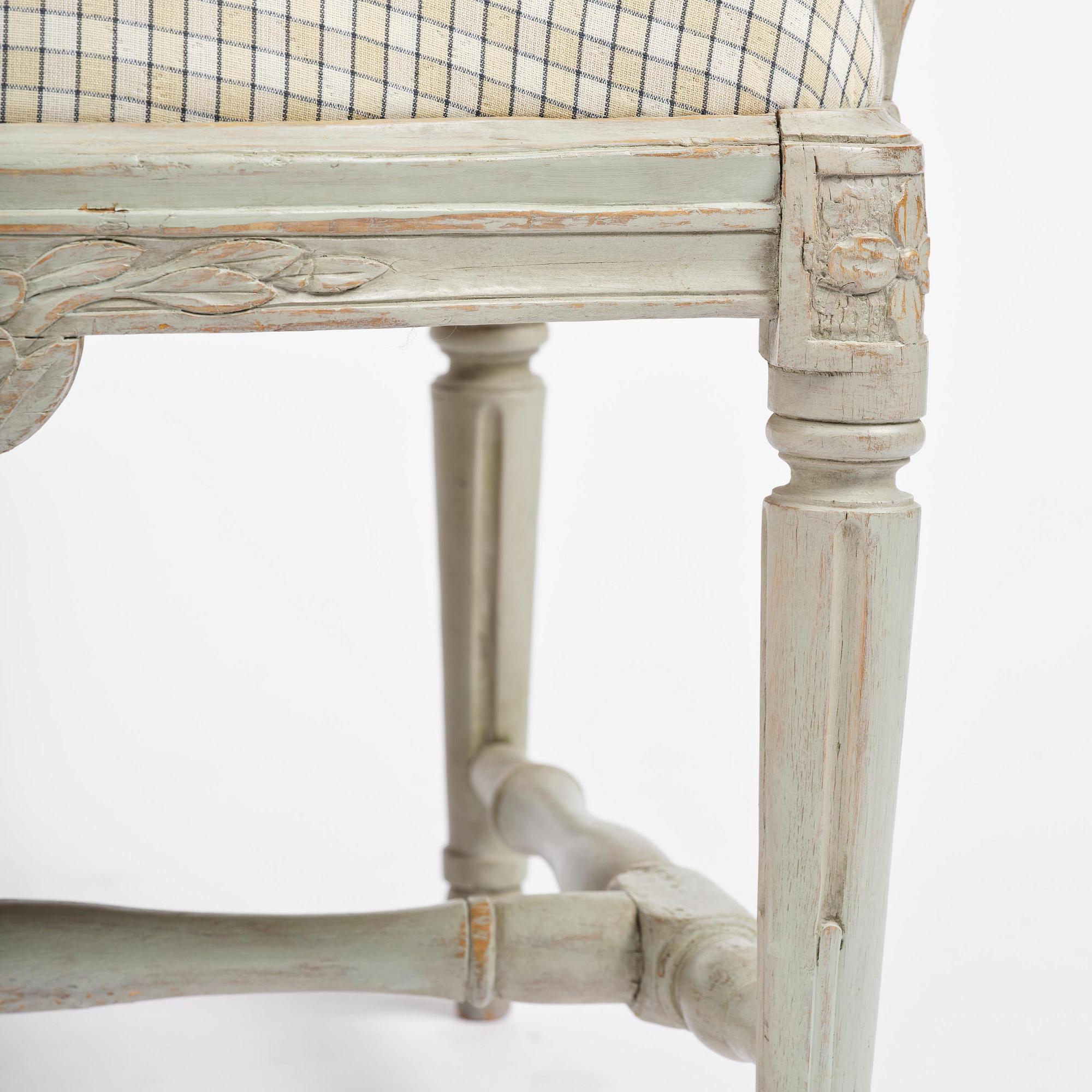 A pair of Gustavian open armchairs, Stockholm, late 18th century.