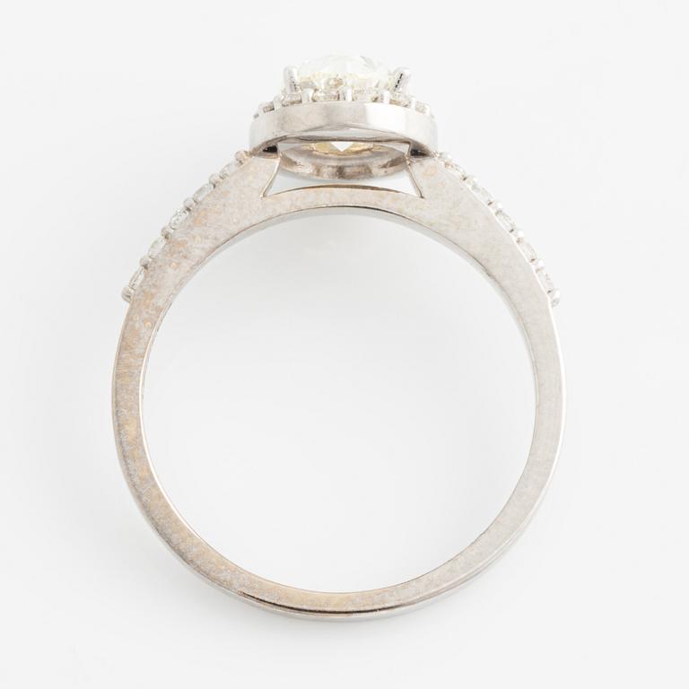 Ring with oval diamond, accompanied by GIA report.
