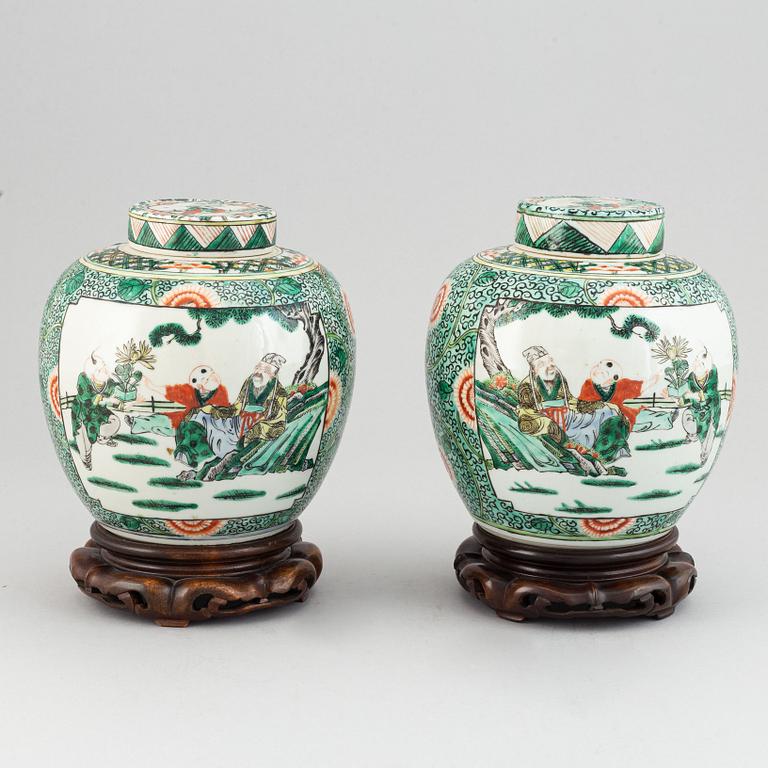 A pair of Chinese famille verte jars with covers, 20th century,