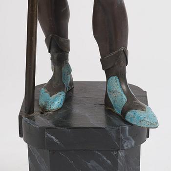 A bronze sculpture of a man in armour, late 19th century.