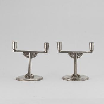 A pair of 1935 pewter candelabras by K E & Co.