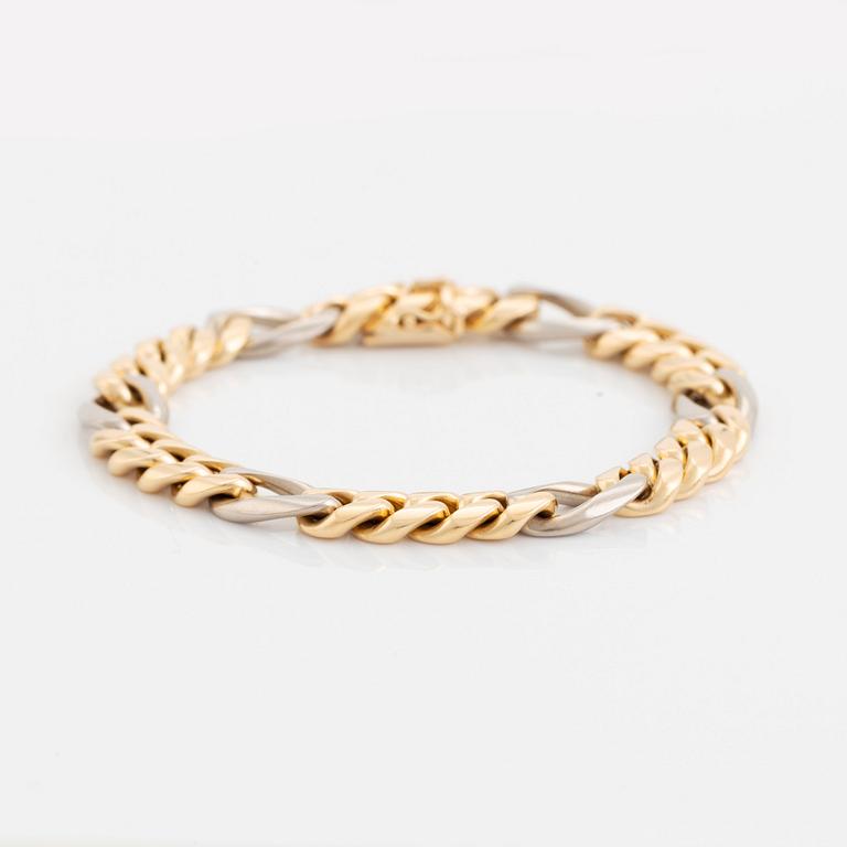 An 18K gold and white gold bracelet by Jan Hellströmer.