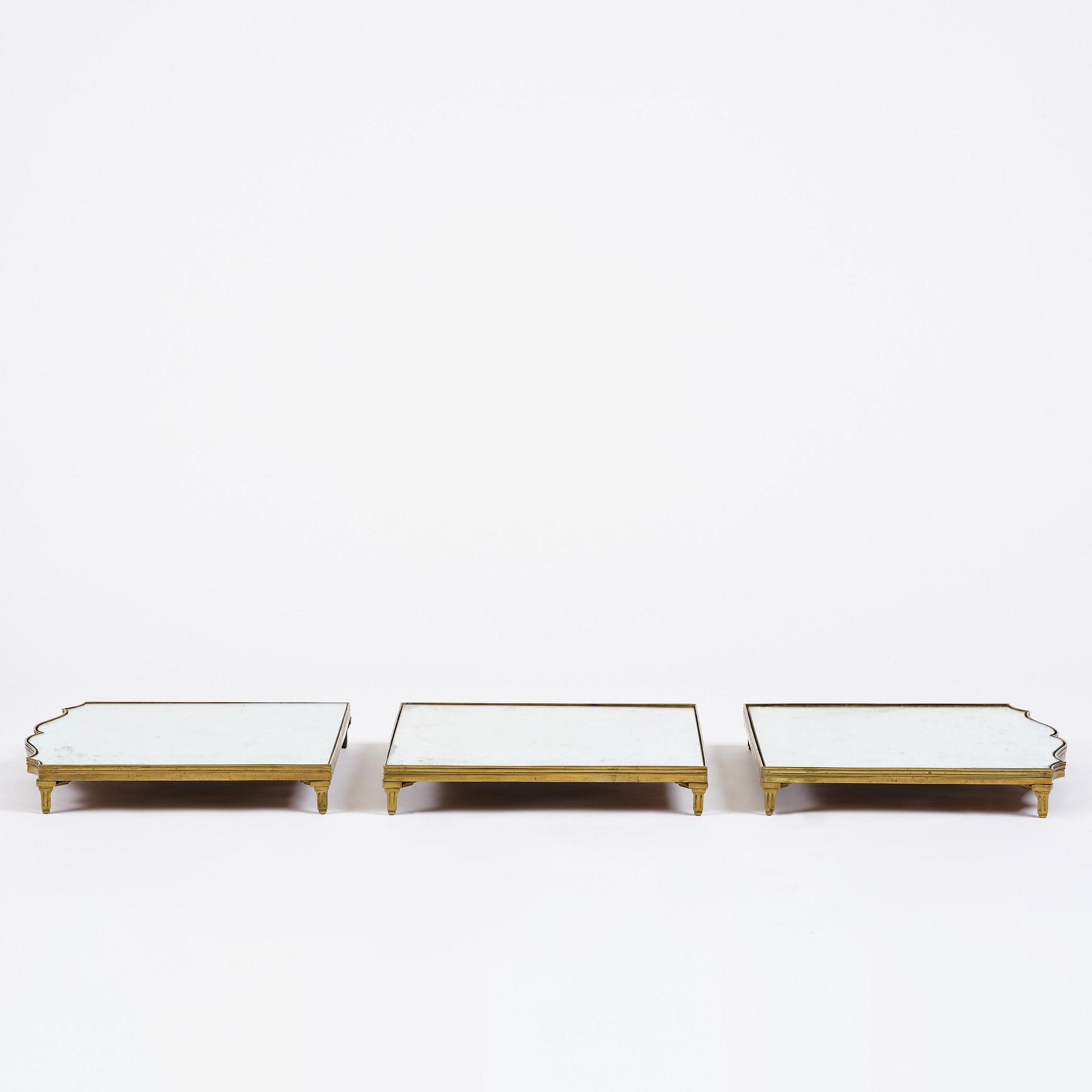 A Gustavian three-piece brass and glass surtout de table, Stockholm, later part 18th century.
