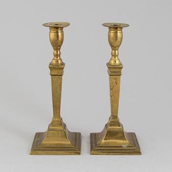 A PAIR OF GUSTAVIAN BRONZE CANDLSTICKS, late 18th century.