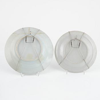A set of 15 famille rose dinner plates, Qing dynasty, Qianlong and one Canton 19th Century.