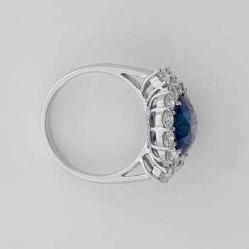 A 5.74 cts sapphire and diamond ring. Total carat weight 1.70 cts.