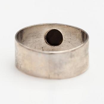 A silver ring and necklace with tiger's eye. Kultasepät Salovaara, Turku 1961.