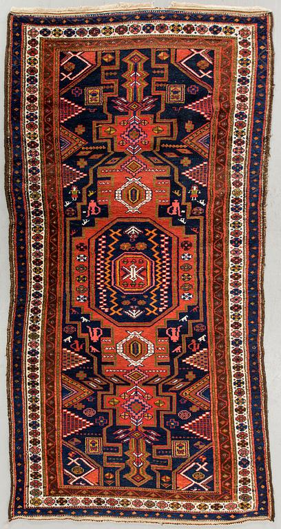 An antique Kurdistan carpet ca 250 x 133 cm.