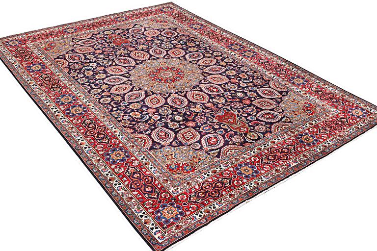 A Meshed carpet, c. 352 x 253 cm.