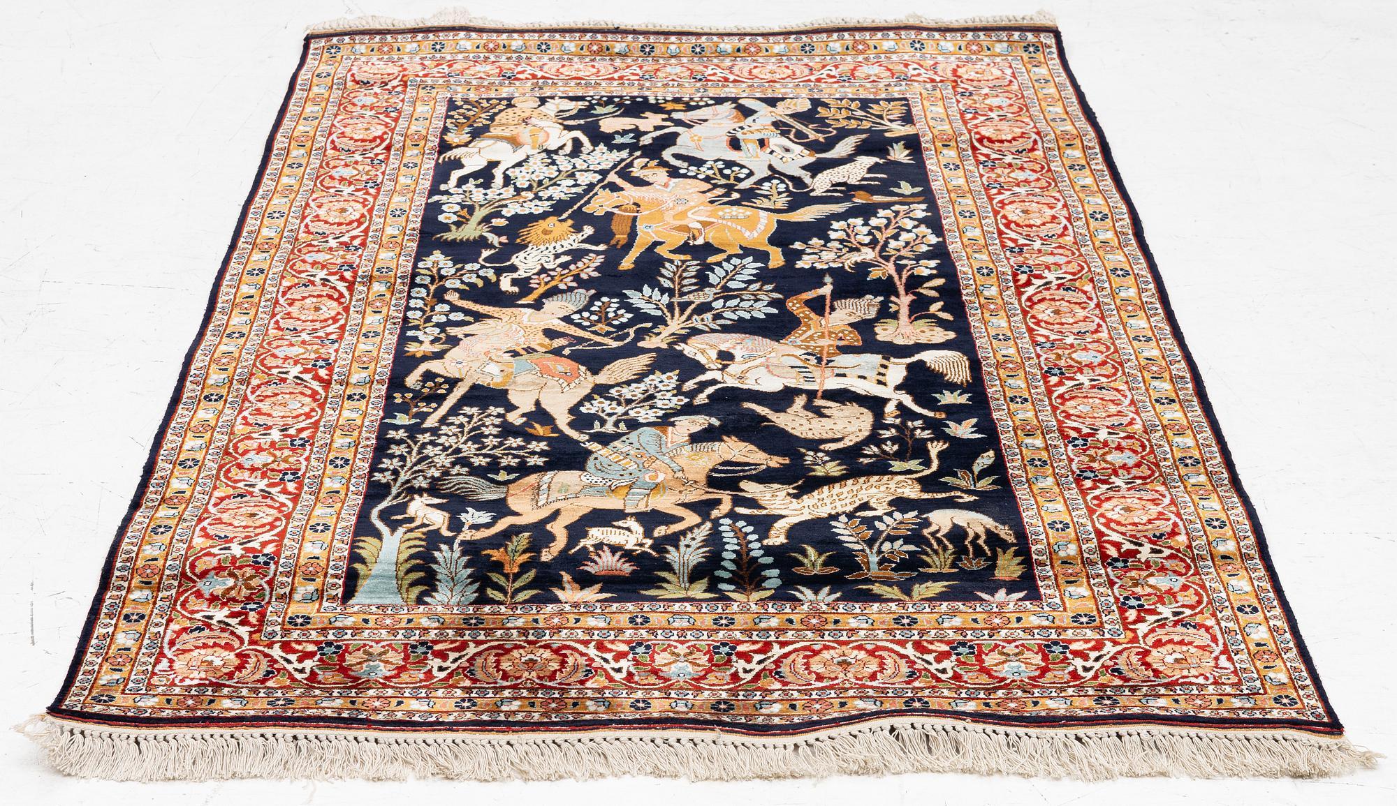 A Kashmir silk rug, c. 168 × 102 cm.