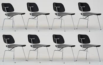 A set of eight Charles & Ray Eames 'DCM' chairs by Vitra.