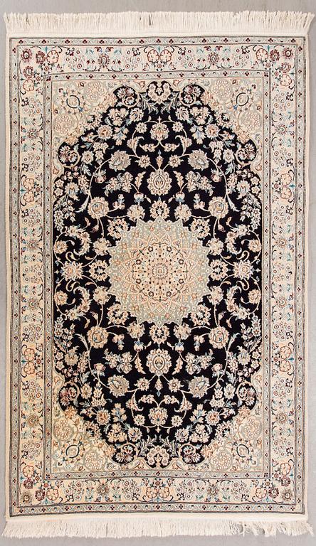 A Nain part silk carpet ca 212x133 cm.