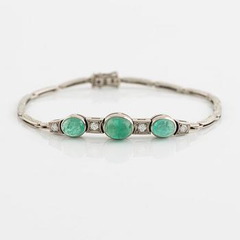 Cabochon cut emerald and brilliant cut diamond bracelet.