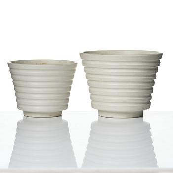 Wilhelm Kåge, A set of three ceramic flower pots, a vase and jar with lid,  Gustavsberg 1930s.