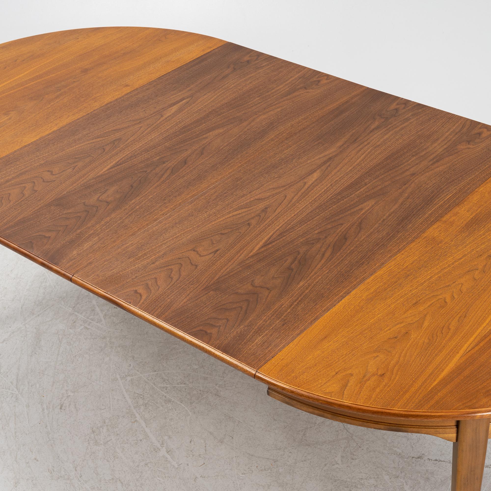Dining table, walnut, mid-20th century.
