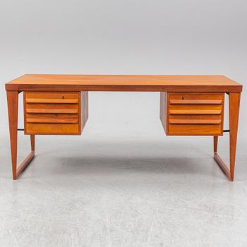 A 1960's teak model 70 writing desk by Kai Kristiansen.