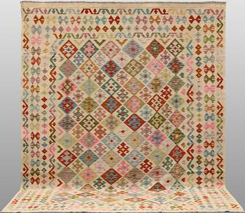 A Kilim carpet, approx. 312 x 243 cm.