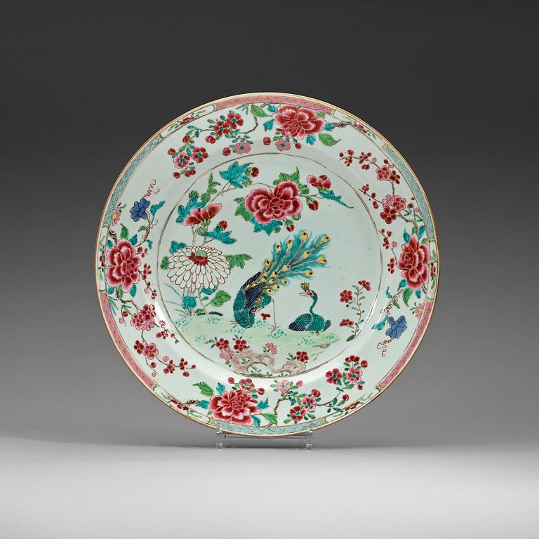 A famille rose 'double peacock' serving dish, Qing dynasty, Qianlong (1736-95).