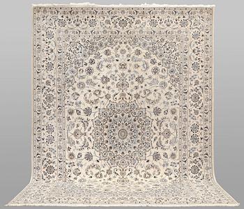 A Nain carpet, part silk, so-called 9LAA, approx. 347 x 253 cm.