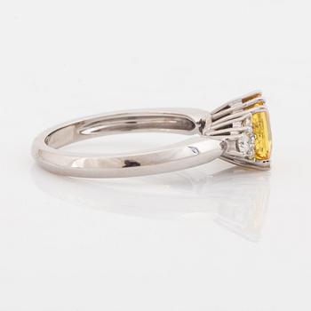Yellow sapphire and diamond ring.