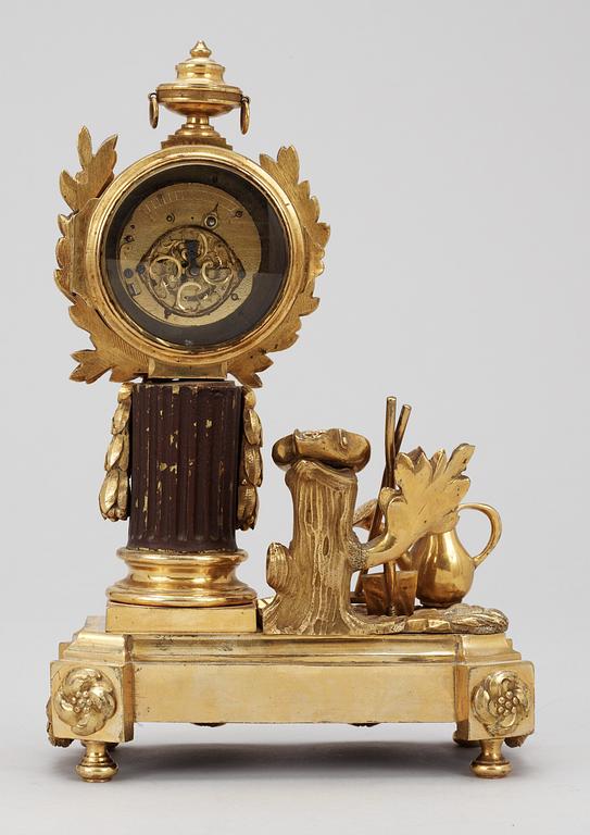 A Louis XVI 18th Century miniature table clock, dial marked "LE ROY A PARIS".