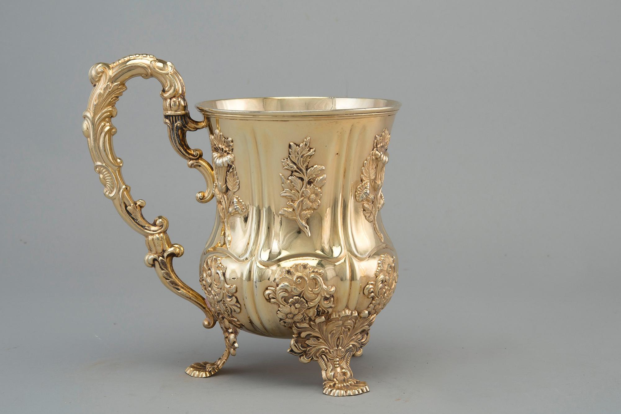 A TANKARD, 84 silver. Gilt. Carl Magnus Stahle St. Petersburg 1842. Height 20 cm, weight 630 g.