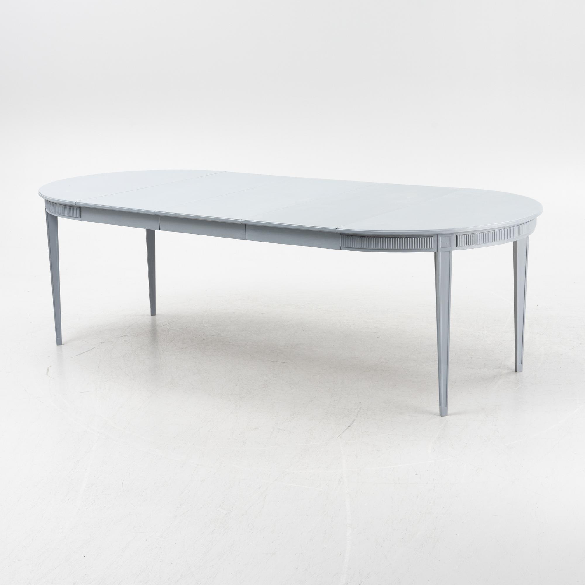 A gustavian style painted dining table, second half of the 20th century.