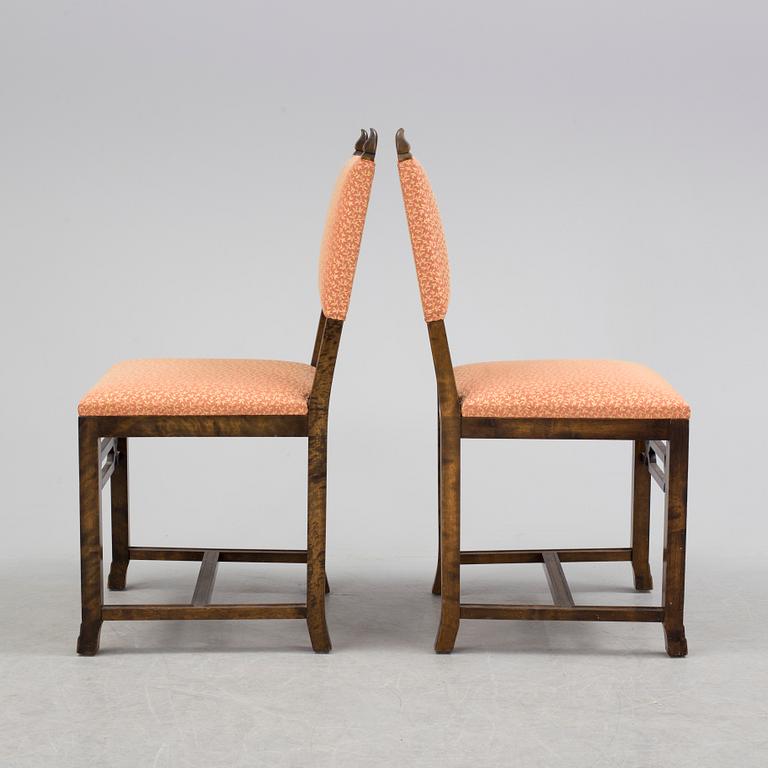 A 1920´s dinner table and six chairs probably designed by Axel Einar Hjorth for AB Svenska möbelfabriken Bodafors.