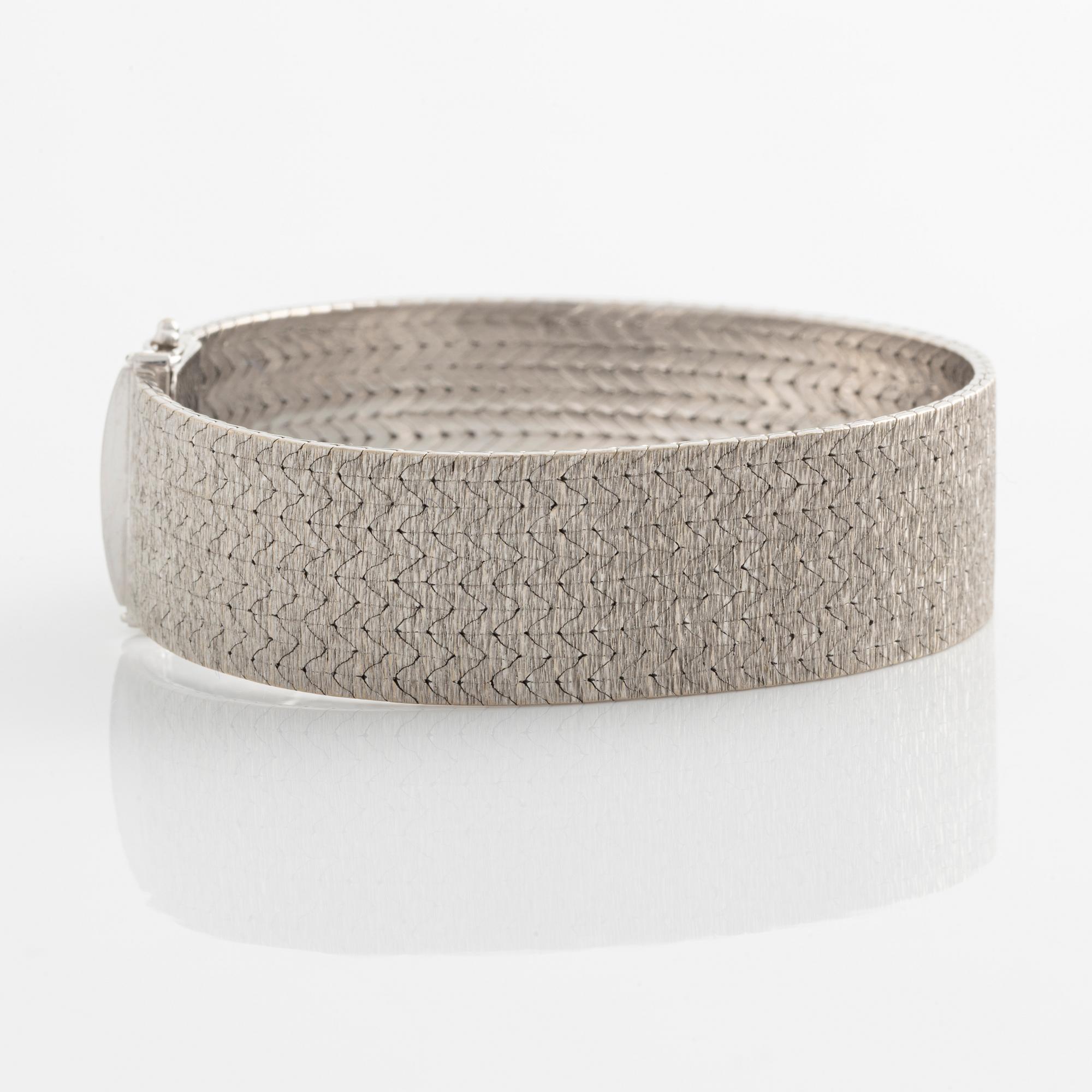 Bucherer armband 18K vitguld.