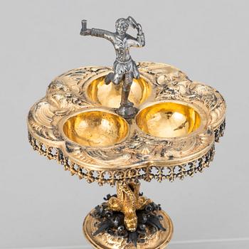 A German parcel-gilt saltcellar/spice rack, makers mark Paulus Braunacker, Nurnberg, probably mid 17th Century.