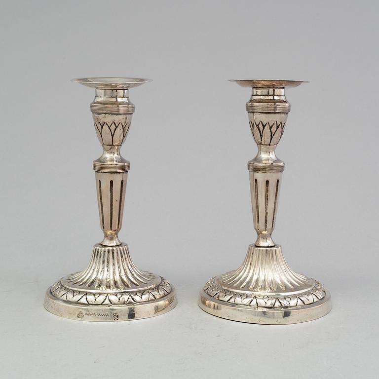 A pair of late 18th century silver candlesticks with unclear hallmarks, possibly from Germany. Weight ca 316 grams.