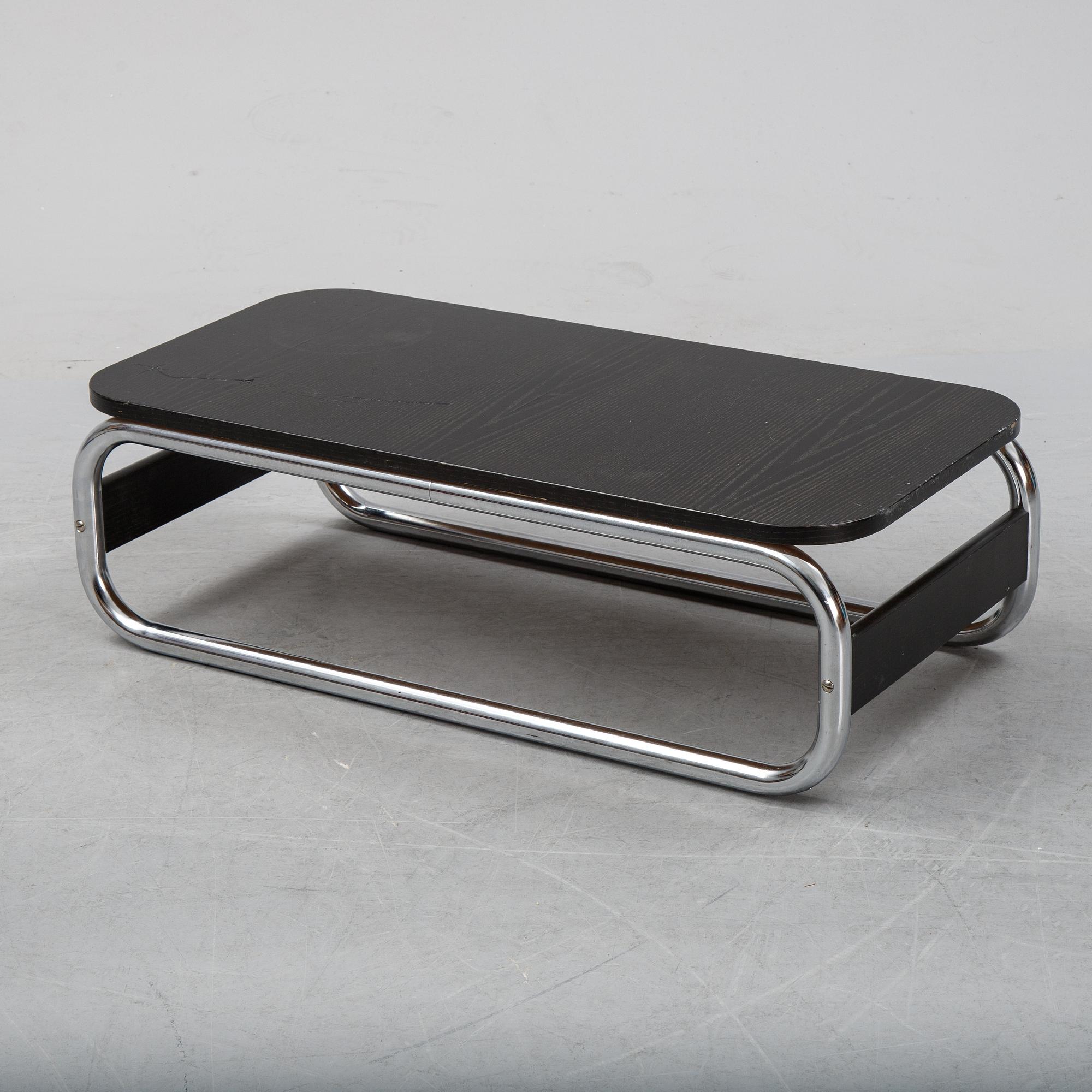A pair of 'Impala' lounge chairs with table by Gillis Lundgren for IKEA, released 1972.