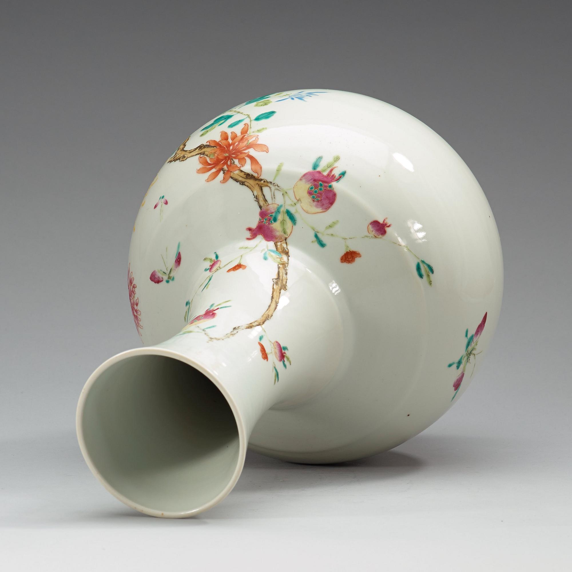 A famille rose vase, China, Republic, 20th Century, with Qianlong four character mark in red.