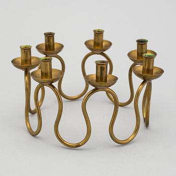 A mid 20th century brass candlestick by Nordiska Kompaniet NK.