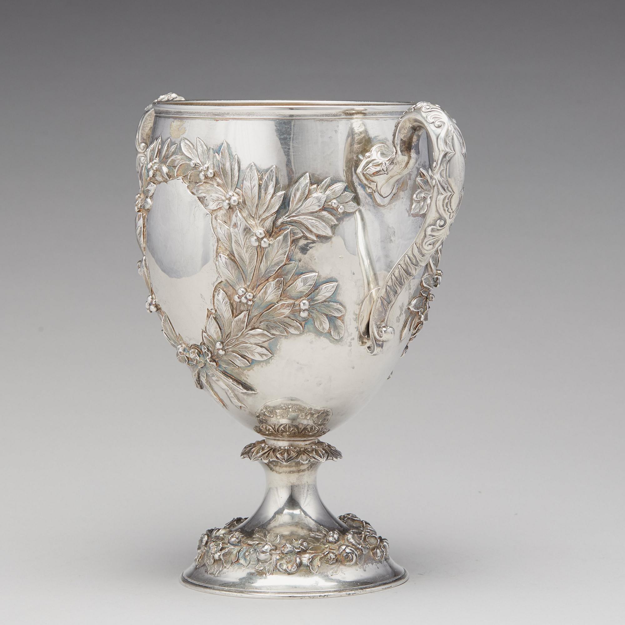 An English 19th century parcel-gilt silver cup, mark of Robert Hennell, London 1863.